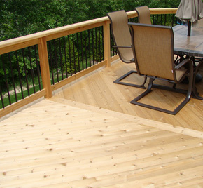 A cedar deck, perfect for bbq and family time in the summer, built by Epic Deck Builders.